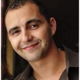 AT