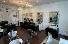 12723077