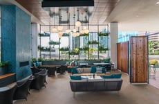 12098977