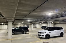 12729857
