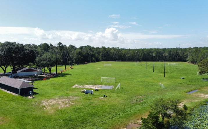 Pictures of Land property located at 26003 TX-321, Cleveland, TX 77327 for sales - image #1