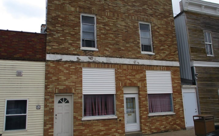 Pictures of Multifamily property located at 317 Main Street, Clutier, IA 52217 for sales - image #1