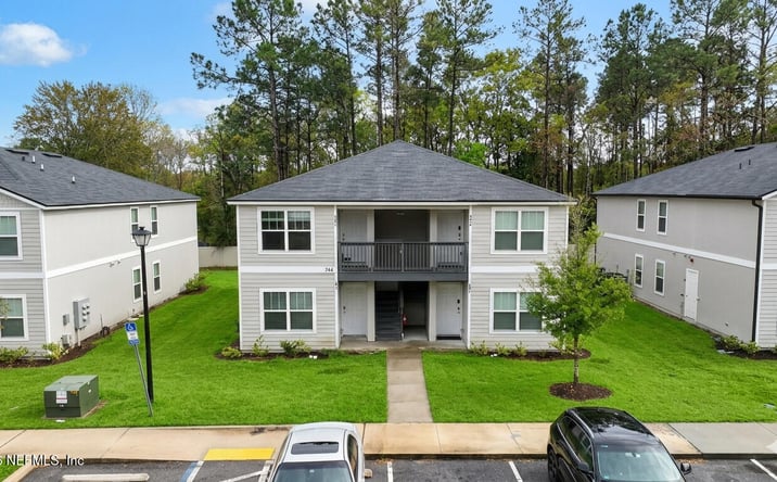 Pictures of Multifamily property located at 7638 MAILES Court 101 #101,102,201,202, Jacksonville, FL 32210 for sales - image #1