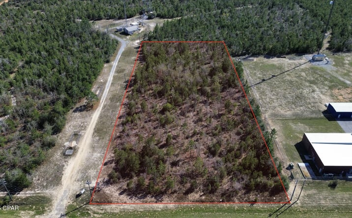 Pictures of Land property located at 12600 E E Hwy 20 Road, Youngstown, FL 32466 for sales - image #1