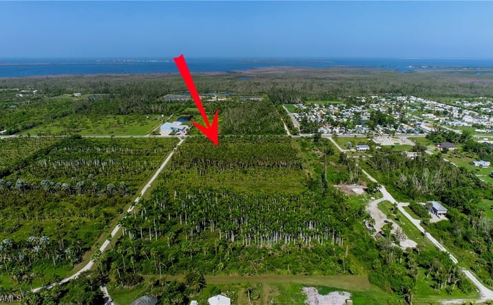 Pictures of Land property located at 14900 Stringfellow Rd, Bokeelia, FL 33922 for sales - image #1