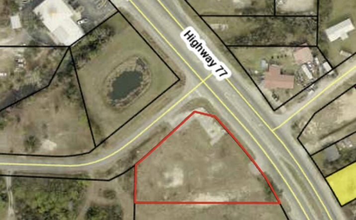 Pictures of Land property located at 7415 Highway 77, Southport, FL 32409 for sales - image #1