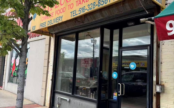 Pictures of Retail property located at 930 Hempstead Turnpike, Hempstead, NY 11010 for sales - image #1