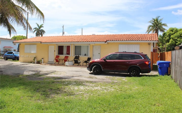 Pictures of Multifamily property located at 1022 NW 22nd Pl, Miami, FL 33125 for sales - image #1