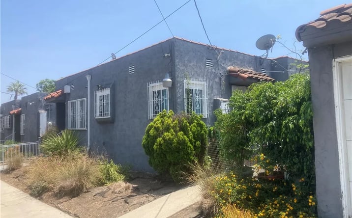 Pictures of Multifamily property located at 302 W 107th Street, Los Angeles, CA 90003 for sales - image #1