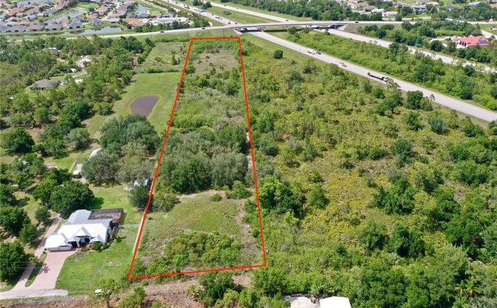Pictures of Land property located at 24630 Tangelo Ave, Port Charlotte, FL 33980 for sales - image #1