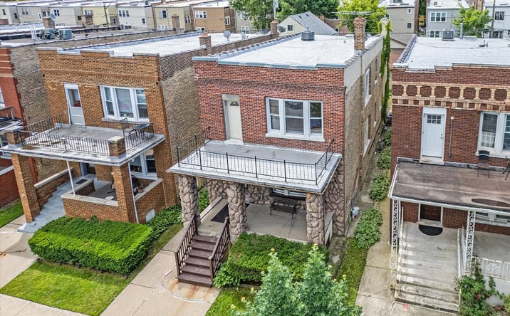 Pictures of Multifamily property located at 4935 W Henderson Street, Chicago, IL 60641 for sales - image #1