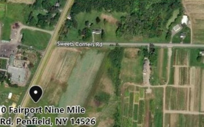 Pictures of Land property located at 1810 Fairport Nine Mile Point Rd, Penfield, NY 14526 for sales - image #1
