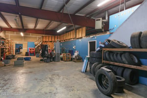 9520077