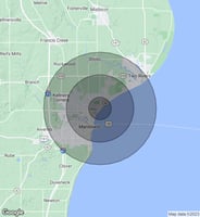 9767115