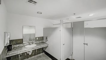 9856733