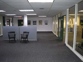 9949877