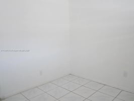 23006949