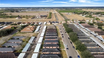 21560772