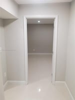 22981157