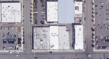 9727697