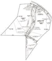 9829785