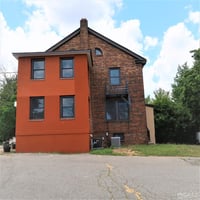 7024597