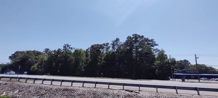 7038726