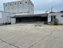 7671693