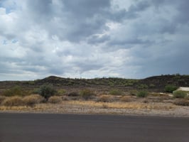 7708877