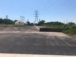 7744035