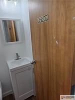 13356037