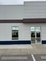 11595610