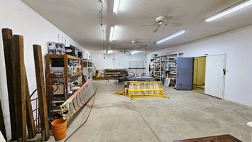 11699579