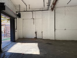 11568610