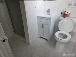 12953750