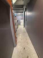 12871702