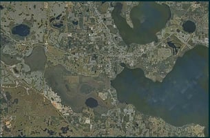 12985627
