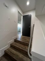 12988841