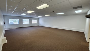12599877