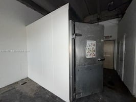 12703884