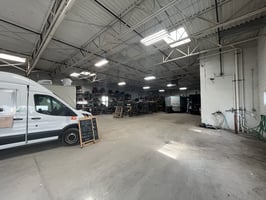 11429542