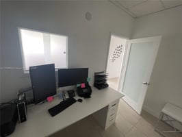 9777716
