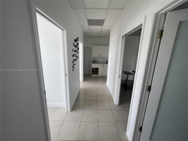 9777718