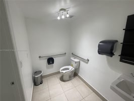 9777719