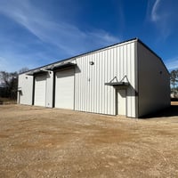 9827851