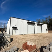 9827849