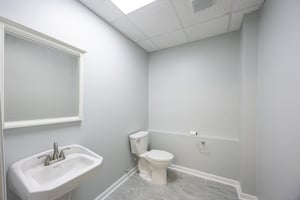 9860122