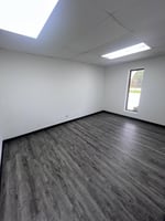 3360565